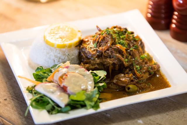 POULET YASSA - OQG RESTAURANT